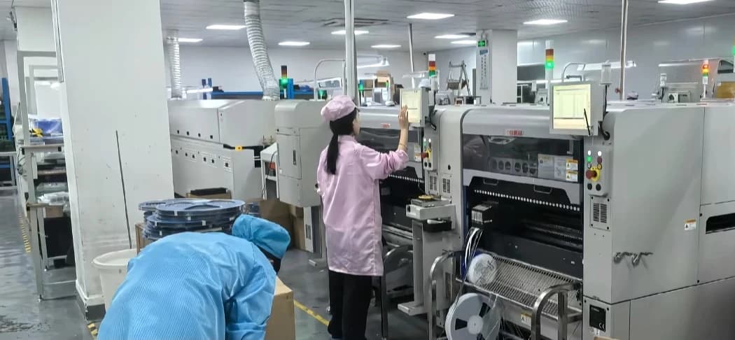 SMT placement and production equipment on a manufacturing floor